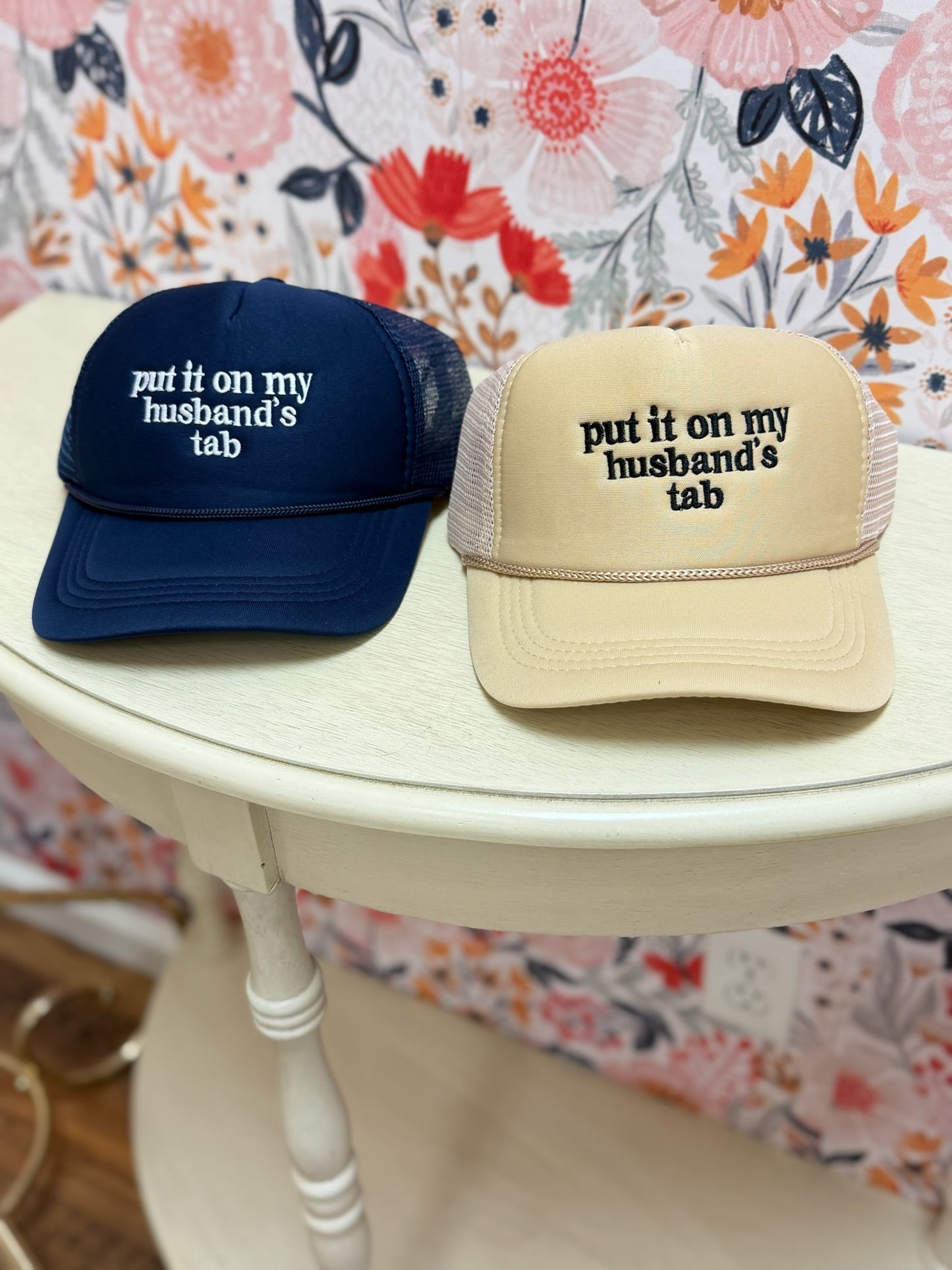 Put It On My Husband's Tab Trucker Hat