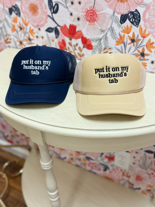 Put It On My Husband's Tab Trucker Hat